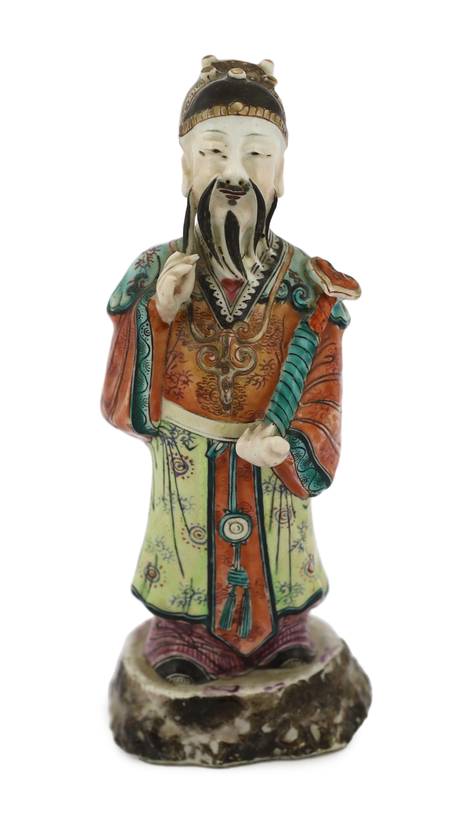 A Chinese enamelled porcelain figure of a court official, Jiaqing period (1796-1820), loss to right index finger
